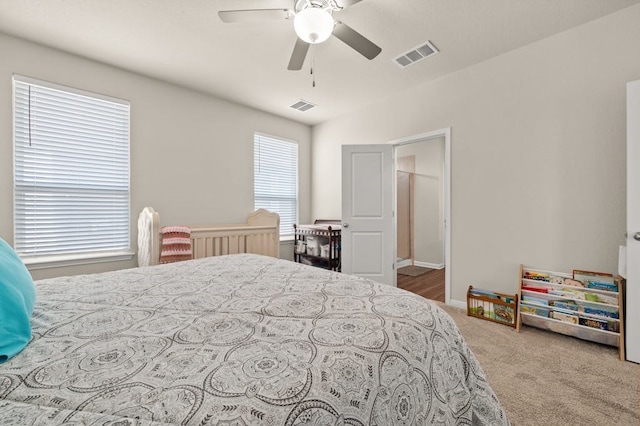 carpeted bedroom with ceiling fan