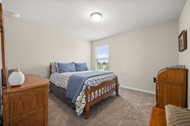 bedroom featuring light carpet