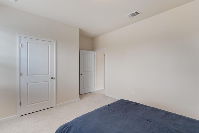 unfurnished bedroom with light carpet