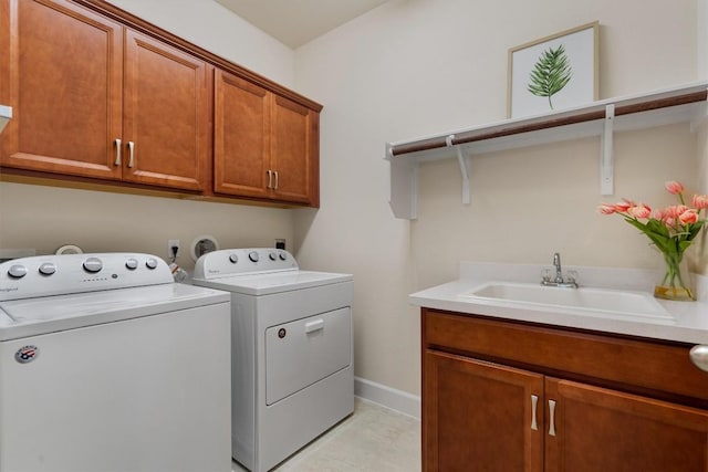 15008 Via Del Corso Dr, Bee Cave, TX 78738 - washroom with cabinet space, washing machine and dryer, and baseboards