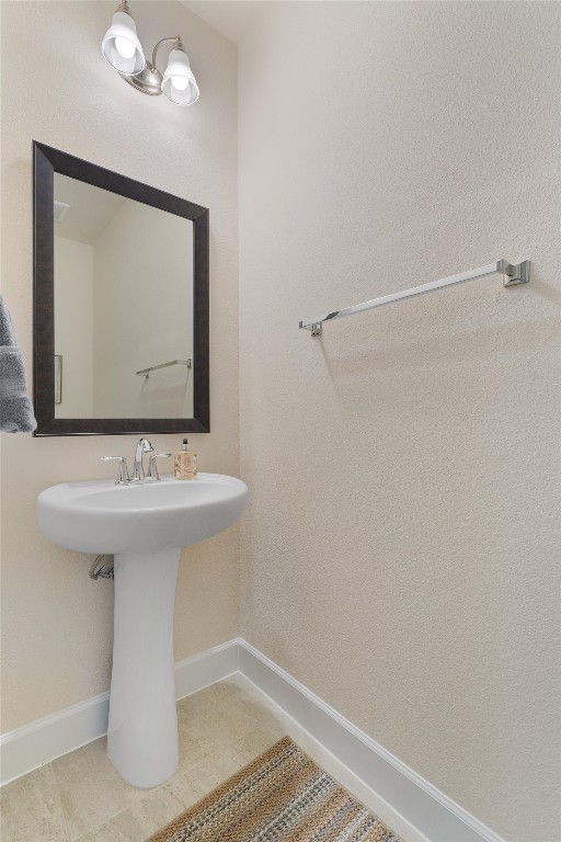 bathroom with tile patterned flooring