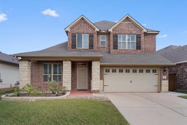 15008 Via Del Corso Dr, Bee Cave, TX 78738 - view of front of home with an attached garage, roof with shingles, driveway, brick siding, and a front lawn