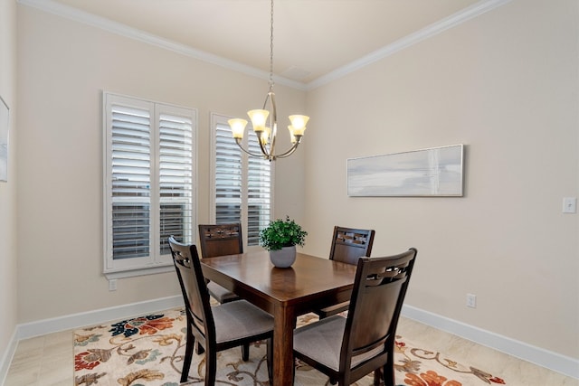 dining space featuring crown molding and a notable chandelier