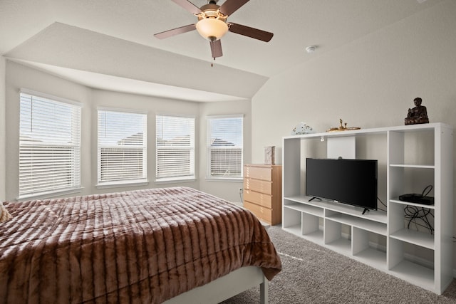 carpeted bedroom with ceiling fan and lofted ceiling