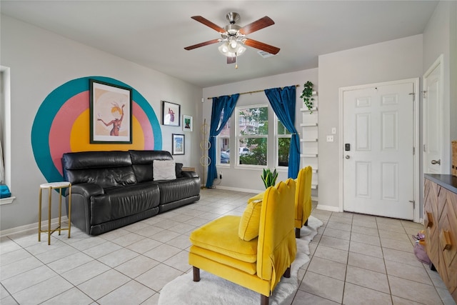 living room with light tile patterned floors and ceiling fan