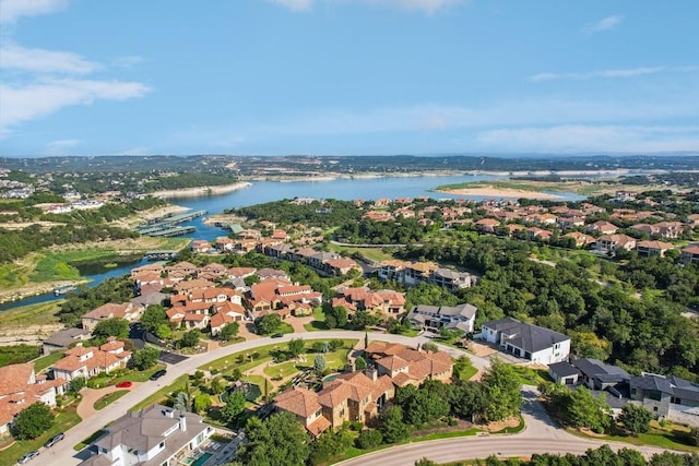 aerial view with a residential view and a water view