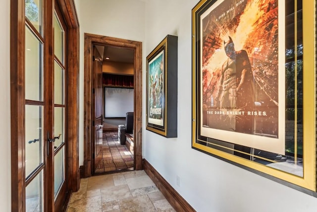 226 Canyon Turn Trl, Austin, TX 78734 - corridor with stone tile floors, baseboards, and french doors