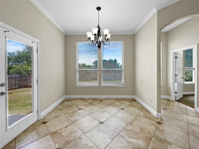 unfurnished dining area featuring crown molding, light tile patterned flooring, and an inviting chandelier