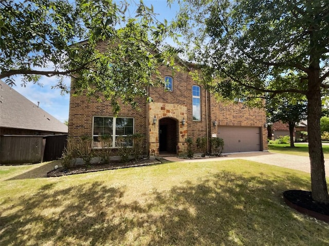 view of front of property with a garage and a front yard