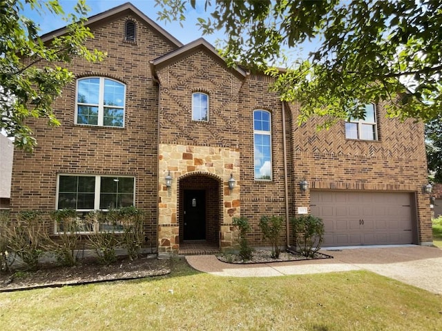 view of front of house featuring a garage and a front lawn