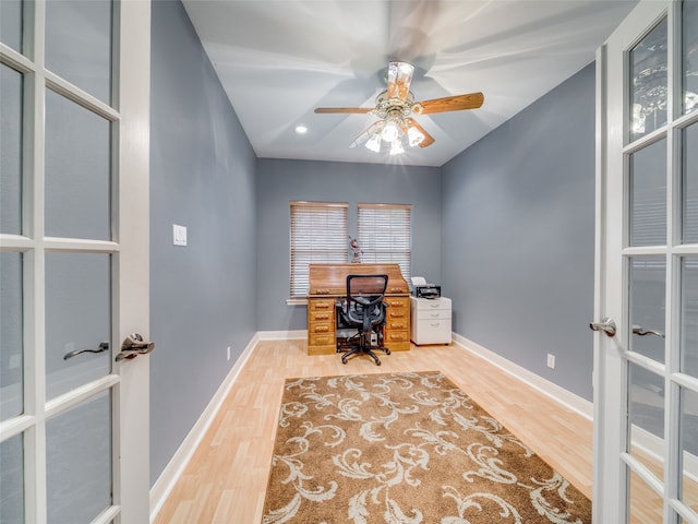 office area featuring french doors, ceiling fan, and hardwood / wood-style flooring