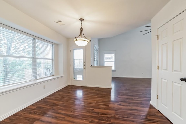 unfurnished dining area with dark hardwood / wood-style floors