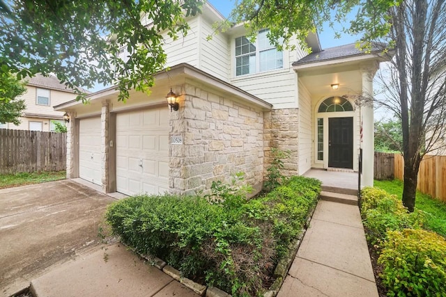 entrance to property featuring a garage