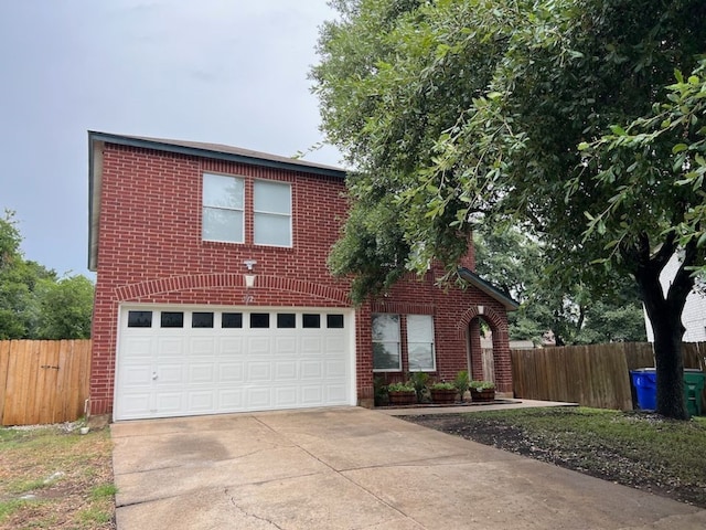 view of front of home with a garage