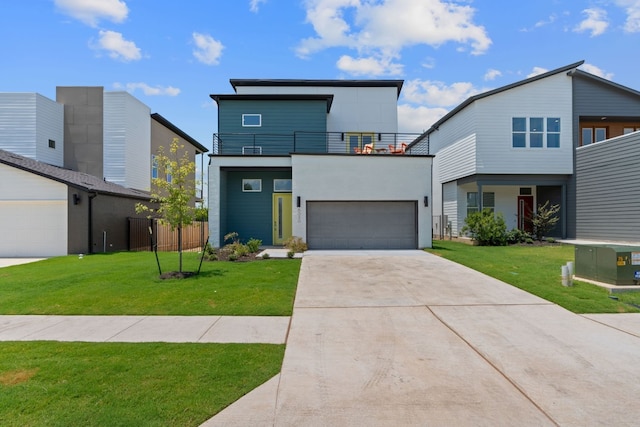 contemporary home with a balcony and a front yard