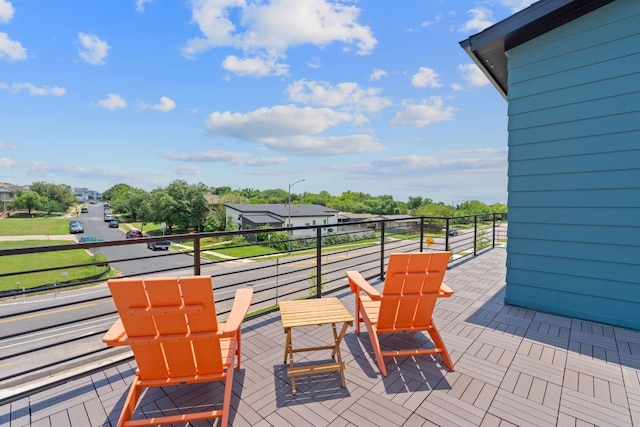 view of patio with a balcony