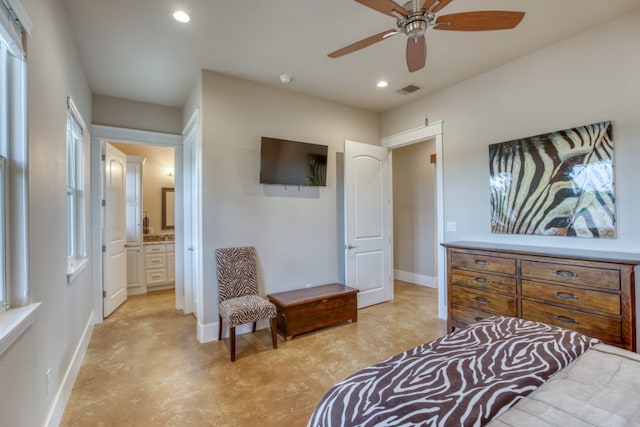 bedroom with ensuite bathroom and ceiling fan