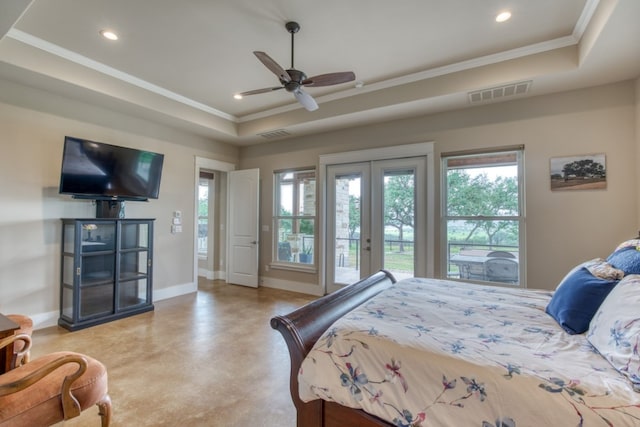 bedroom with multiple windows, ceiling fan, a raised ceiling, and access to outside