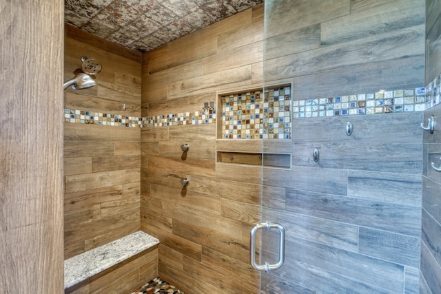 bathroom featuring an enclosed shower