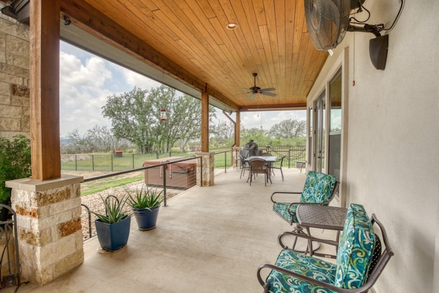 view of patio / terrace featuring ceiling fan