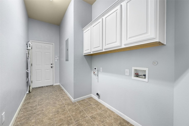 laundry area with light tile patterned floors, gas dryer hookup, hookup for a washing machine, cabinets, and electric dryer hookup