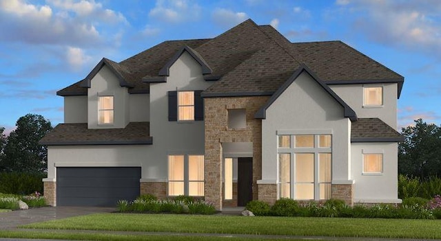 view of front of property with driveway, stone siding, a garage, and stucco siding