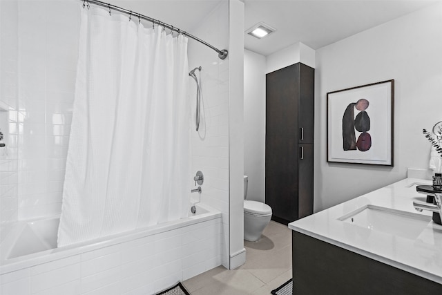 full bathroom with tile patterned flooring, vanity, toilet, and shower / tub combo with curtain