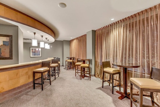 interior space with recessed lighting and light colored carpet