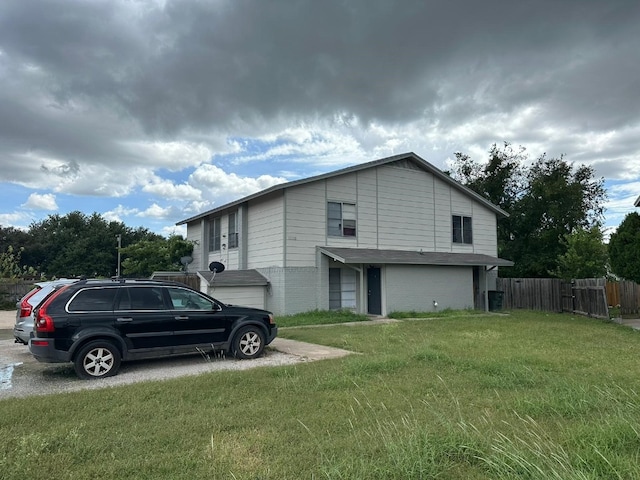 view of property exterior with central AC and a lawn