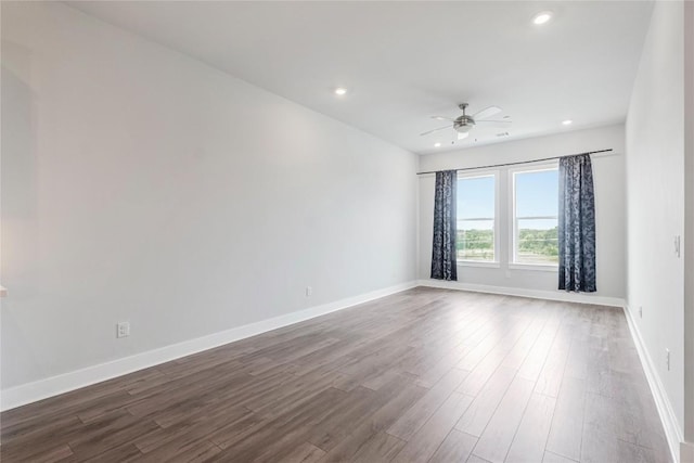 4507 E Martin Luther King Jr Blvd Unit 122, Austin, TX 78721 - spare room with dark wood-type flooring, ceiling fan, baseboards, and recessed lighting