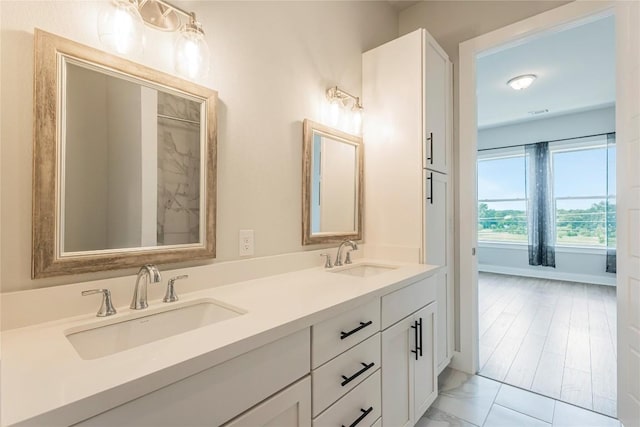 4507 E Martin Luther King Jr Blvd Unit 122, Austin, TX 78721 - full bathroom featuring double vanity