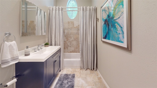 bathroom with vanity and shower / bath combo with shower curtain