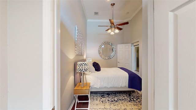bedroom with crown molding