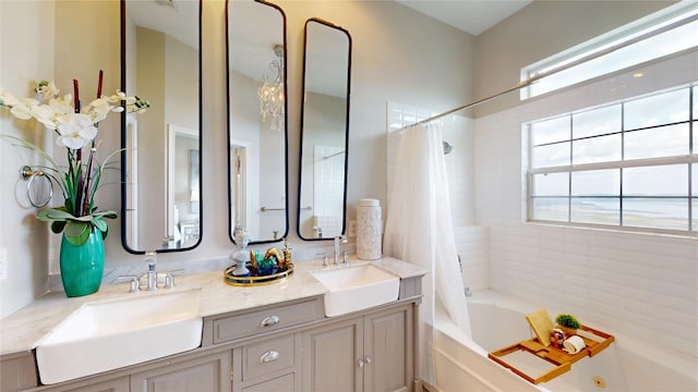 bathroom with vanity and shower / bath combo with shower curtain