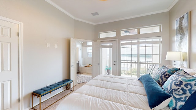 bedroom with ornamental molding, access to exterior, and connected bathroom