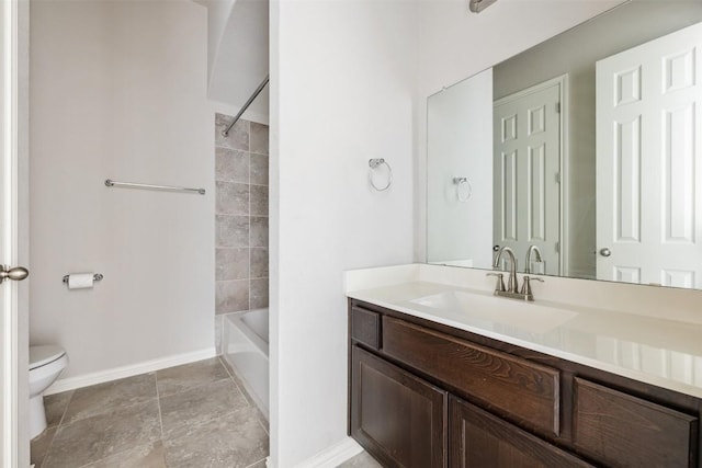 full bathroom with vanity, tiled shower / bath combo, toilet, and tile patterned flooring