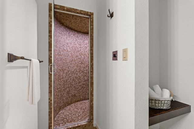 bathroom featuring a stall shower