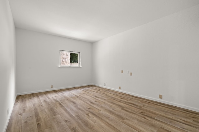 1 Crystal Springs Ct Unit G, The Hills, TX 78738 - unfurnished room featuring light wood finished floors and baseboards