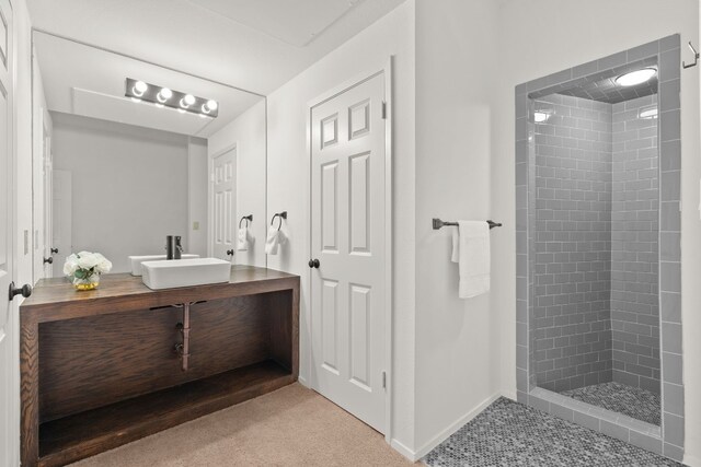 1 Crystal Springs Ct Unit G, The Hills, TX 78738 - bathroom with a tile shower and vanity