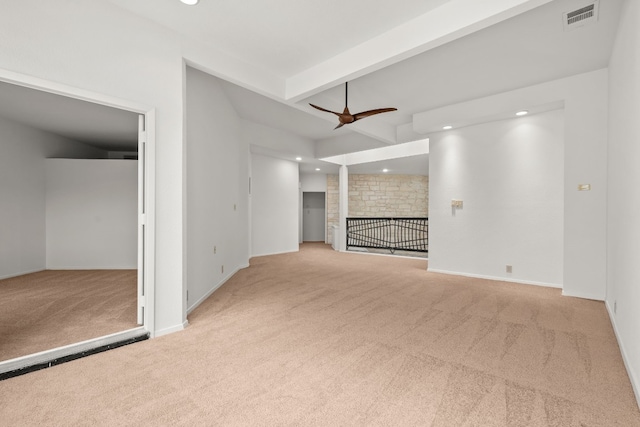 unfurnished living room featuring visible vents, a ceiling fan, beam ceiling, recessed lighting, and carpet flooring
