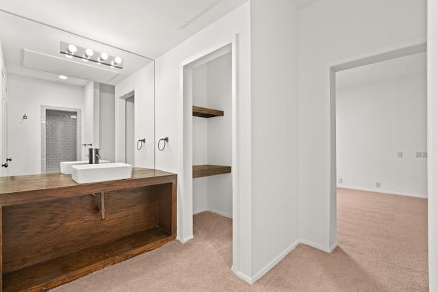 1 Crystal Springs Ct Unit G, The Hills, TX 78738 - full bathroom featuring vanity and baseboards