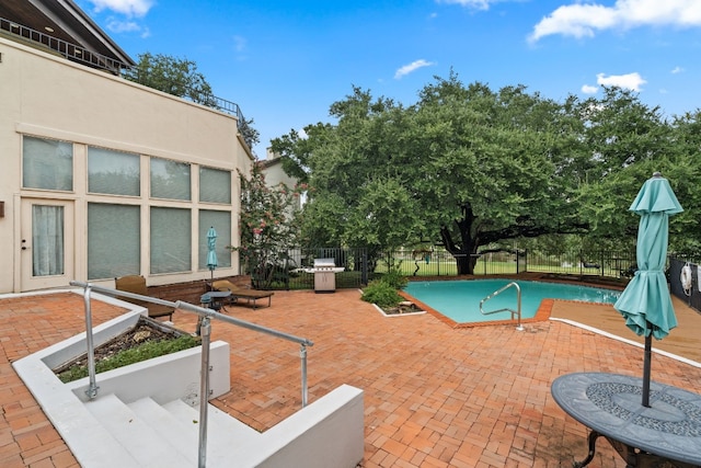 1 Crystal Springs Ct Unit G, The Hills, TX 78738 - view of pool featuring a patio and a fenced backyard