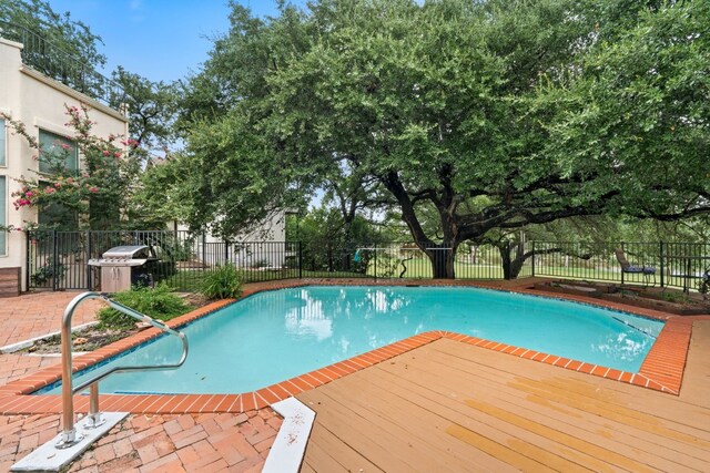 1 Crystal Springs Ct Unit G, The Hills, TX 78738 - view of pool featuring a deck