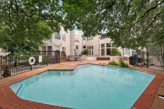 1 Crystal Springs Ct Unit G, The Hills, TX 78738 - view of swimming pool with a patio