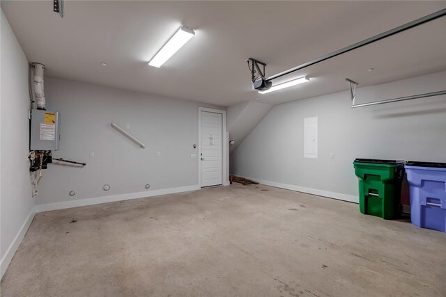 garage featuring water heater and a garage door opener