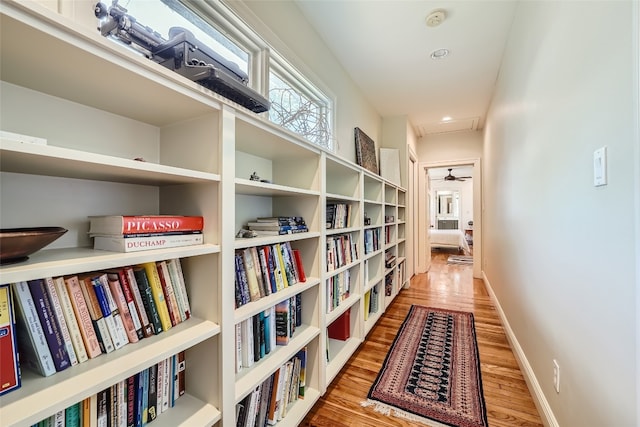 corridor featuring light hardwood / wood-style flooring