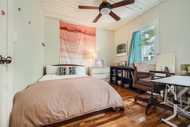 bedroom featuring ceiling fan and hardwood / wood-style flooring