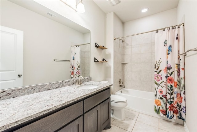 full bathroom featuring toilet, shower / bath combination with curtain, vanity, and tile patterned floors