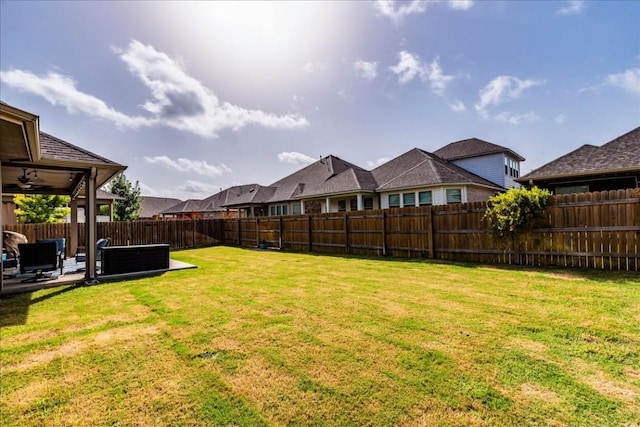 view of yard featuring a fenced backyard and a patio