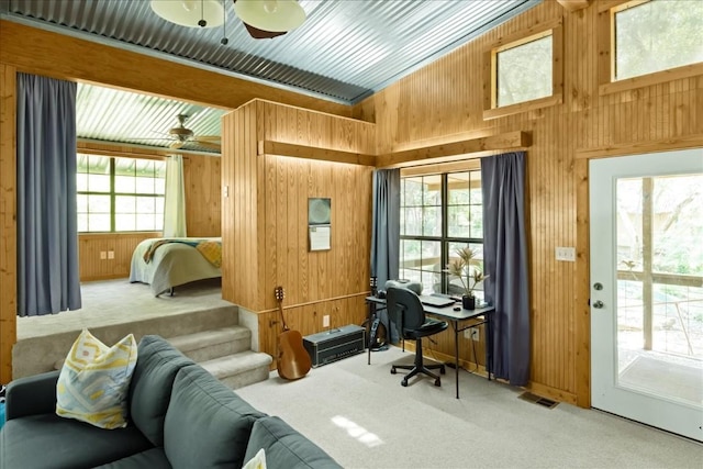 2108 River Hills Rd, Austin, TX 78733 - office featuring carpet floors, wooden walls, ceiling fan, and lofted ceiling